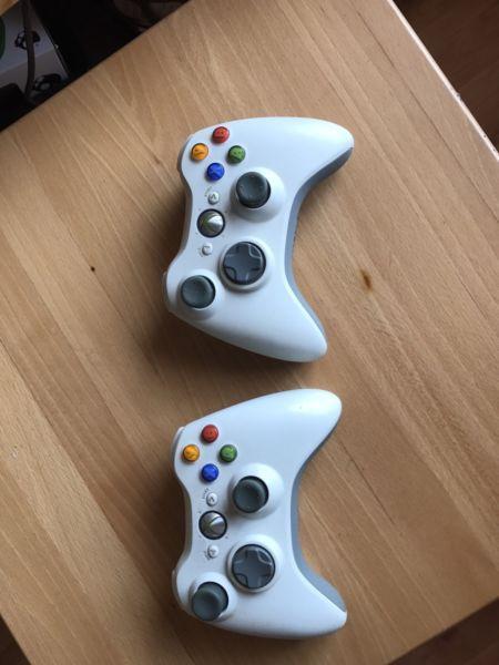 Xbox 360s two controllers Kinect and 20 games