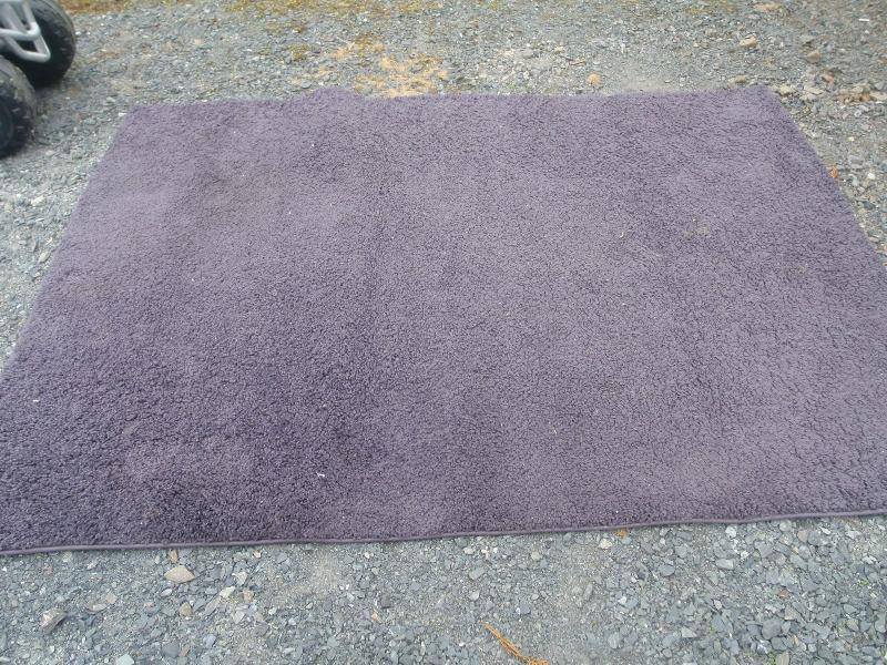 large brown rug , only used for a few week