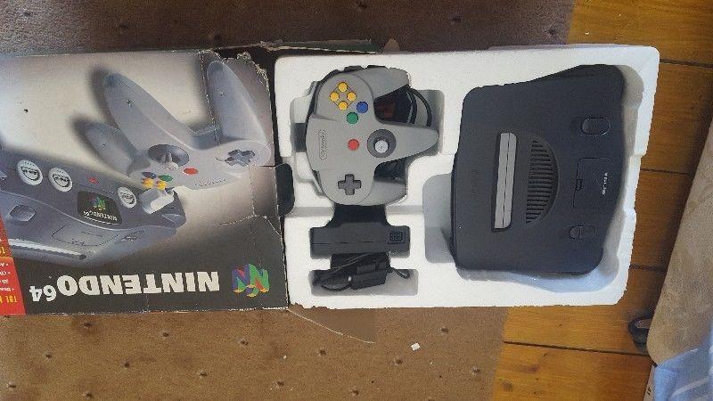 Nintendo 64 console with 3 games
