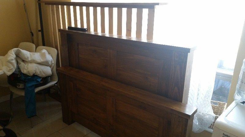 Dark varnish double wooden bed for sale