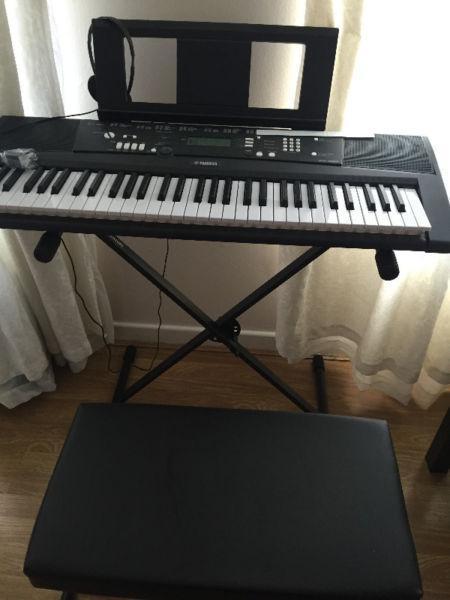 keyboard Yamaha EZ-220 with stand and chair