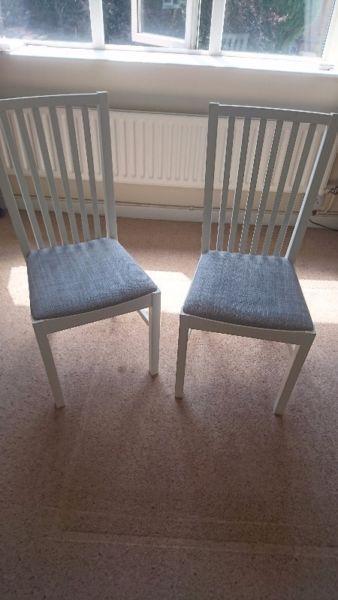 Two IKEA Norrnas chairs