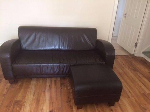 High quailty brown leather sofa and foot stool for sale