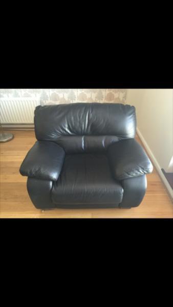 Black leather arm-chair