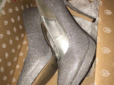 Silver heels worn twice