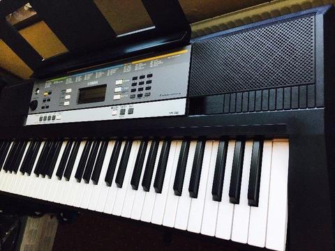 Yamaha Keyboard with Headphones, Power Supply, and Stand