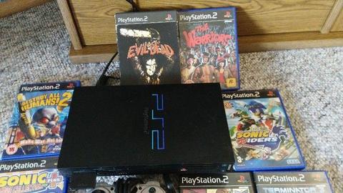 PS2 console with 11 games for sale