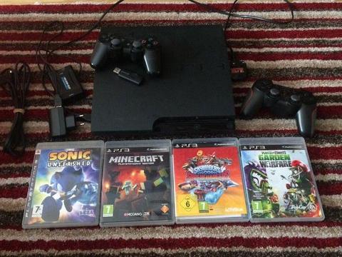 PS3 Console with 4 games & two controllers