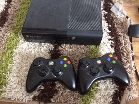 Xbox 360 with 2 wireless controllers and games