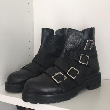 Black buckle ankle boots