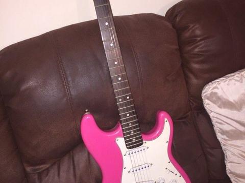 Electric pink guitar