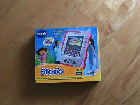 VTECH Storio Console and Story Books for sale