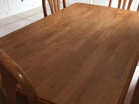 6 seater wooden table and chairs