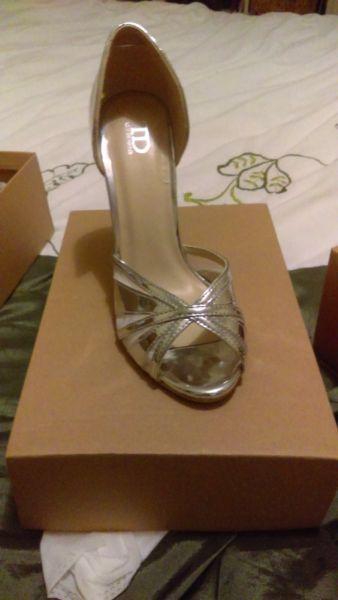 2 Beautiful BNIB silver heels