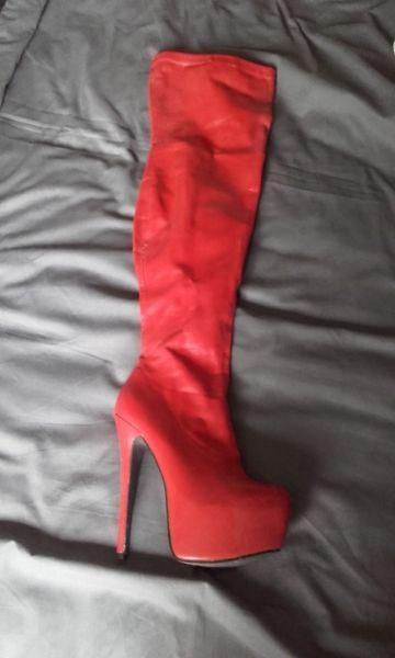 Red knee high boots