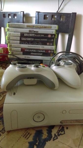 Xbox 360 console with 2 controllers and 15 games