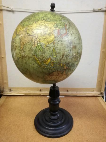 Antique globe on wood turned base