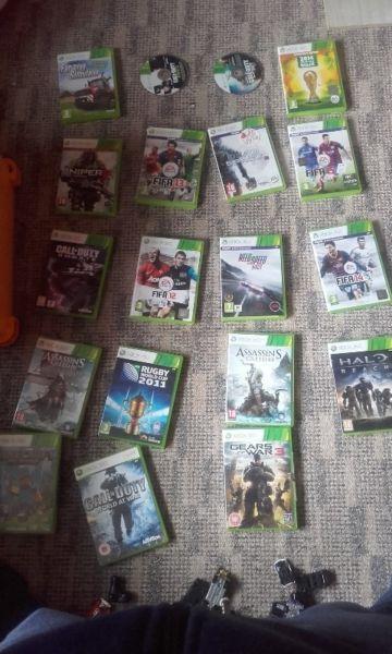 Xbox 360 with two controllers and 20 games