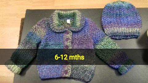 Hand knitted baby clothes