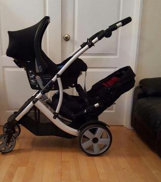 Dimples Double Buggy and baby start car seat