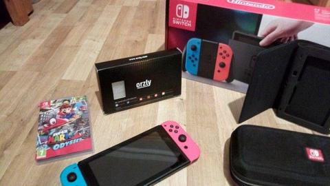 €350 Nintendo Switch Neon Odyssey and 2 Cases Bundle Perfect condition