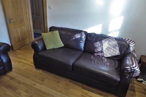 Elegant Italian leather sofa and armchair
