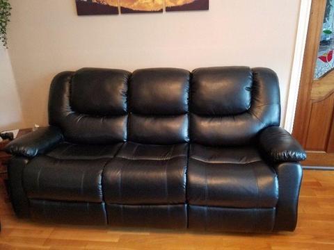Sofa 3x1x1 Black recliners less than 8 months old, excellent condition, collection only