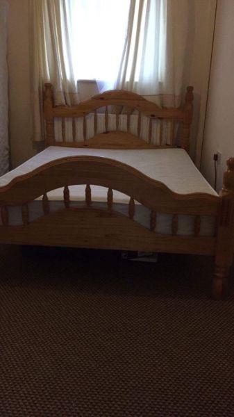 Double size wooden bed with mattres