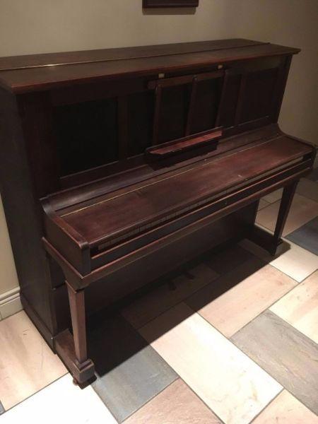 Mahogany case upright piano
