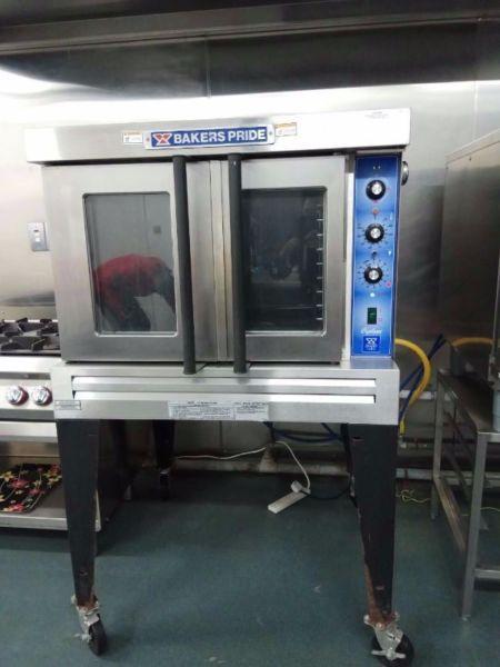 Reduced for SALE --commercial baking gas ovens, stainless steel tables, gas cooker & steel fridge