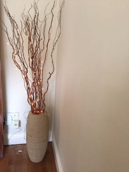 Ceramic vase with electric plug in twig lights
