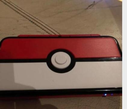New Nintendo 2DS XL Pokeball edition for sale