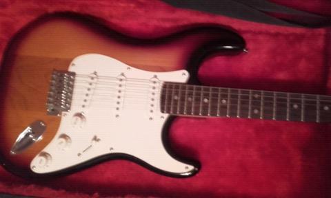 Fender Squier Strat electric guitar including hard case