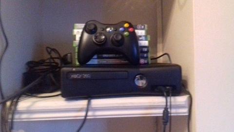 Xbox360 with 7 games -good condition