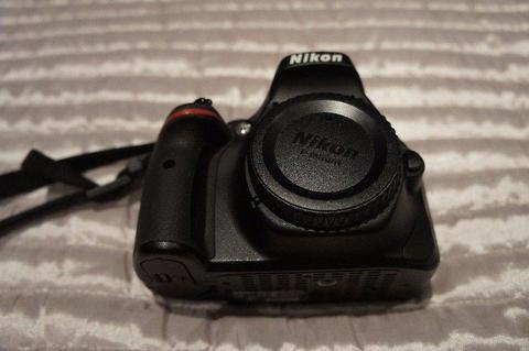 Nikon D5200 camera (body only) with original box +extra battery