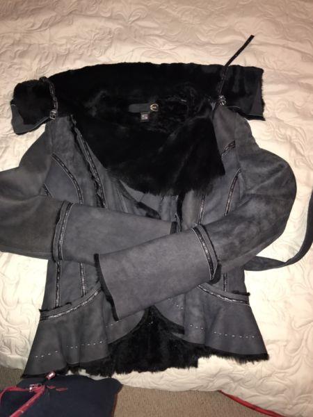 Coat with black cavalli fur