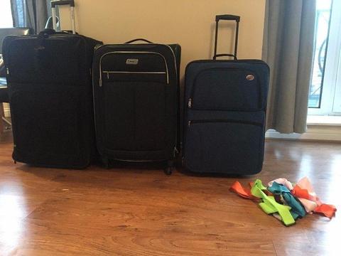 3 medium to large suitcases