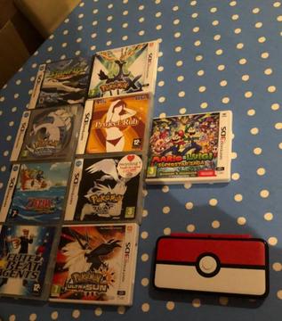 Nintendo 2DS XL Pokeball Edition + 9 games for sale