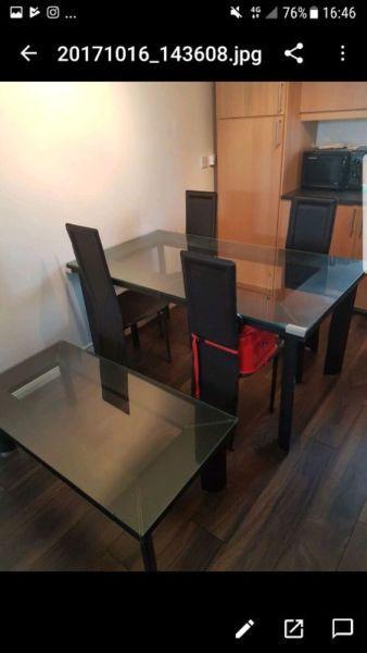 Dining table,6 leather chairs and coffee table to match.great condition, ready to collect!!!