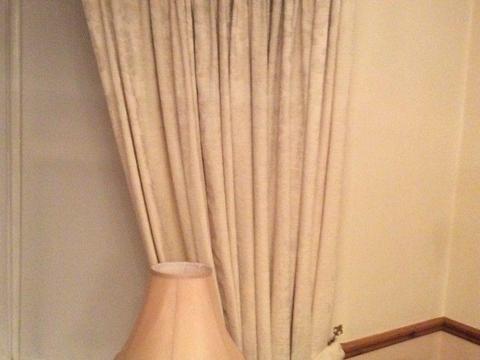 Curtains cream lined and a pelmet