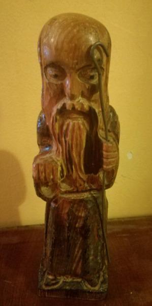 Old solid wood carved figure