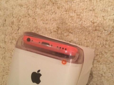 iPhone 5c UNLOCKED red brand new plastic sealed. 32GB modeL