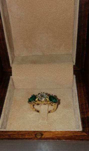 18 k gold Diamond and emerald ring