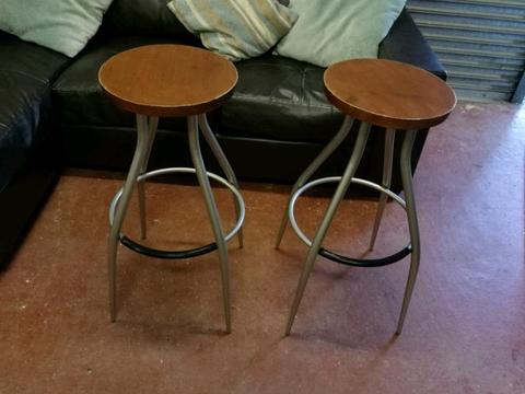 Two swivel counter stools