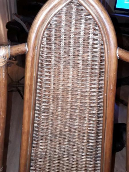 Two high back wicker chairs for sale