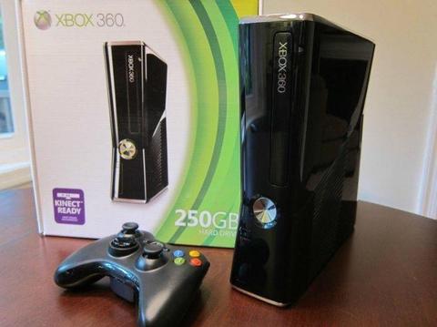 Xbox 360 with controllers and games