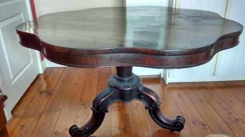 A Victorian Rosewood and Mahogany centre table
