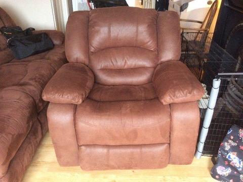 Sitting room arm chair that rocks & reclines. Barely used, excellent condition