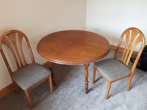 Solid pine dining room table and 4 chairs for sale