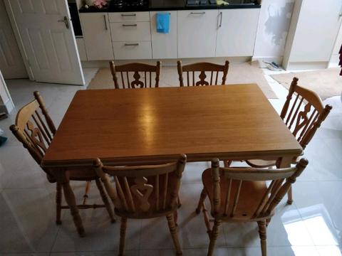 Wooden Tables and 6 Chairs